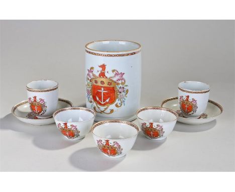 Eight pieces of 18th Century Chinese export armorial porcelains, to include one tankard, two cups, three tea bowls and two sa