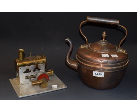 A miniature brass steam engine model; a copper kettle (2)