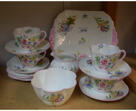 A Shelley wild flowers pattern four piece tea set, including cake plate, sugar bowl, cups saucers etc, printed marks, No 1366