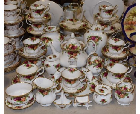 A Royal Albert Old Country Roses pattern tea service for twelve, comprising cups, saucers, tea plates, sandwich plates, cake 