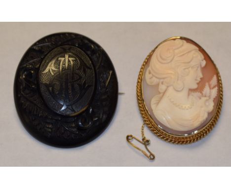 Jewellery - a 9ct gold framed oval portrait cameo brooch, London 1976, 17.8g gross;  a Victorian carved Jet oval brooch, cent