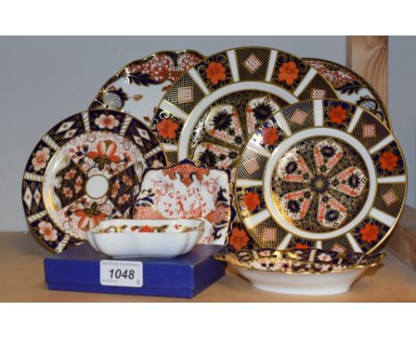A Royal Crown Derby 1128 pattern dessert plate; an 1128 tea plate; a 383 pattern shaped circular dessert plate; a 383 pattern