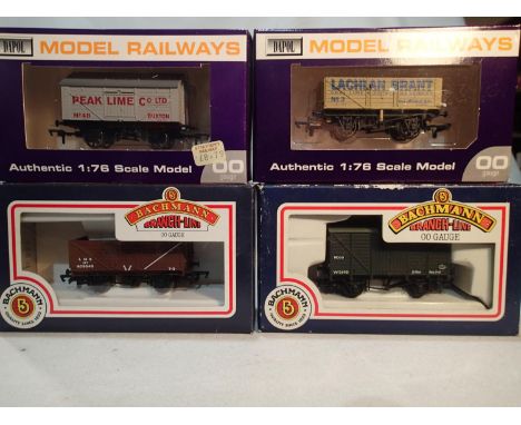 Four OO wagons, Dapol Peak Lime and Lachlan Grant, and Bachmann LMS open and BR Mogo van, excellent condition, wear to boxes.