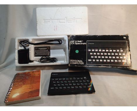 Boxed Sinclair ZX Spectrum with PSU, Paperwork and software pack. Item is in excellent physical condition, unable to test as 