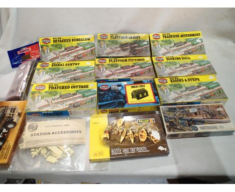Fourteen OO scale railway accessory kits, engine shed, cottages, bridge, plus Kelc Kraft DAF truck, appear complete, boxes wi