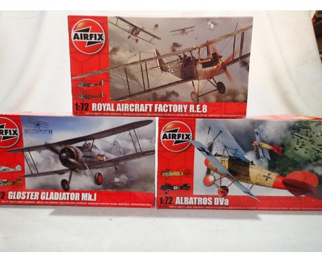Three Airfix 1/72 scale biplane kits, Gloster Gladiator, R.E.8, and Albatros DVA, appear complete, storage wear to boxes. UK 