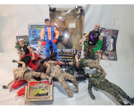 Mixed toys to include a boxed WWR Ring Giants Bret Michaels, unboxed 1990s Action Man, comics, diecast and a Commodore 64 Dat