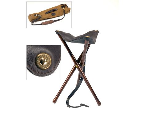 JAMES PURDEY & SONSA NEW AND UNUSED LIGHTWEIGHT WOOD AND LEATHER TRIPOD SEAT,with leather carry handle, brass fittings, with 