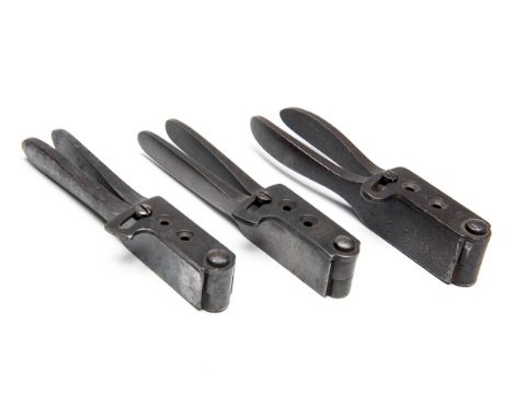 COLT, USATHREE ORIGINAL IRON DOUBLE-CAVITY BULLET MOULDS FOR COLT REVOLVERS,all signed 'COLTS PATENT' on the sprue cutters an