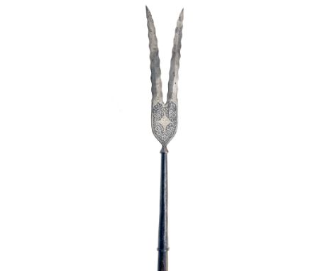 A GOOD INDO-PERSIAN 'SNAKETONGUE' POLEARM HEAD,mid 19th century, the head on a tapering iron socket decorated with silver kof