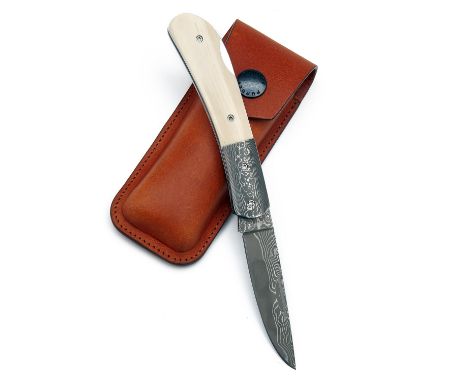 JAMES PURDEY AND SONSA FINE NEW AND UNUSED DAMASCUS STEEL AND MAMMOTH TUSK FOLDING KNIFE,with 2 1/2in. lock blade, damascus s