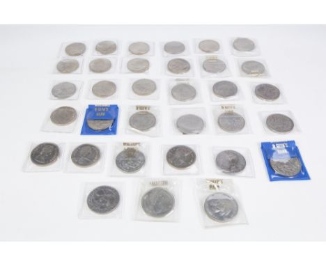 THIRTY THREE QUEEN ELIZABETH II COMMEMORATIVE CROWN COINS IN ALMOST MINT CONDITION viz Charles and Diana's wedding 1981 x 17,