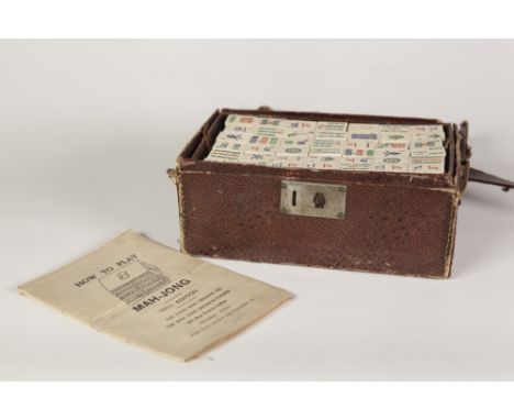 BONE AND BAMBOO MAH-JONG SET IN CASE, CIRCA 1940's appears complete with four trays of playing pieces and instruction booklet