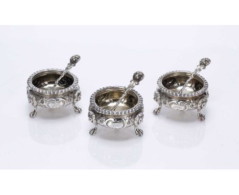 Set of three Victorian silver salts with matched spoonswith lion mask decoration, bearing marks for Elkington & Co (Frederick