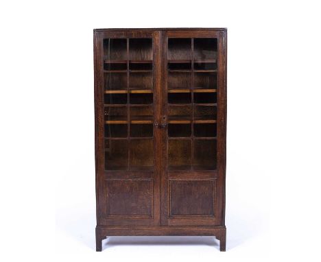 Healsoak, glazed bookcase, circa 1920, has a key, 97cm x 168cm x 29cmCondition report: Overall light wear, marks and small sc