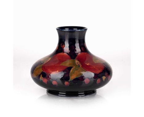 Moorcroft pottery'Pomegranate' squat vase, with impressed marks and facsimile signature to the base, 12cm highCondition repor