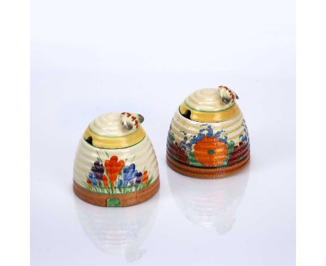 Clarice Cliff (1899-1972)'Gayday' honeypot and matched cover, marked to the base, 9cm high overall and a 'Autumn Crocus' hone