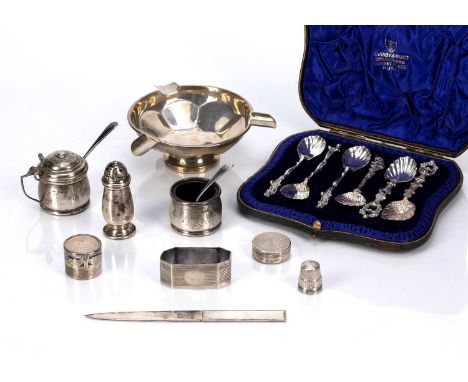 Collection of silver itemsconsisting of: napkin rings, pedestal dish/ashtray, thimble, pepperette, silver cased tape measure,