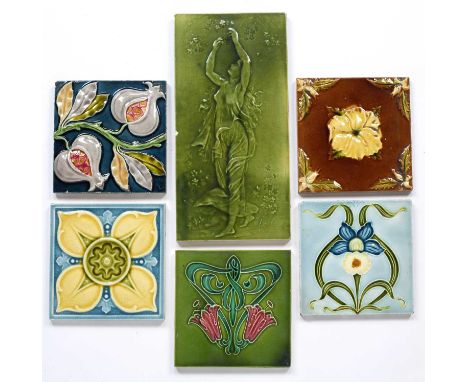 Collection of six art nouveau tilesincluding: Minton floral tubelined examples, a Mucha figure inspired green tile, 30.5cm x 