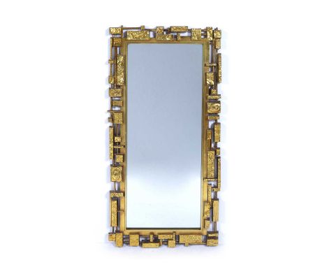 Syroco (Brutalist style)mirror with gold coloured frame, marked to the reverse, 50cm x 108cm overallCondition report:Overall 