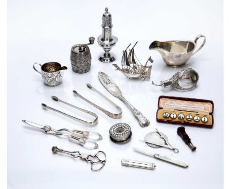 Collection of silver and white metal consisting of: silver sauce boat, 117g approx overall, silver grape scissors, 94g approx