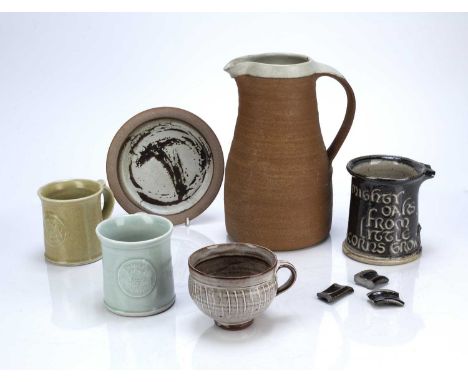 Collection of studio ceramics and pottery consisting of: a Leach pottery (St. Ives) jug, 23cm high, a pottery 1/2 pint tankar