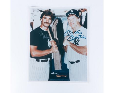 Signed in blue and silver ink. This photograph features Mickey Mantle and Don Mattingly holding baseball bats. Issued: 20th c