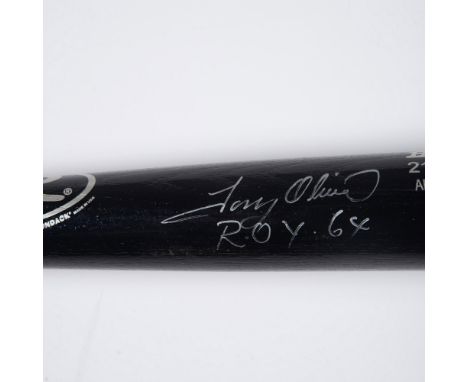 This is a black Big Stick #212B professional model baseball bat signed in silver by Rookie of the Year for 1964, Tony Olivia.