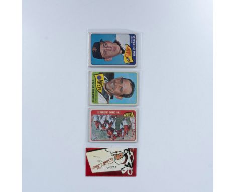 A set of baseball cards sealed in plastic, topped with a Christmas card that says From Santa Claus, featuring players such as