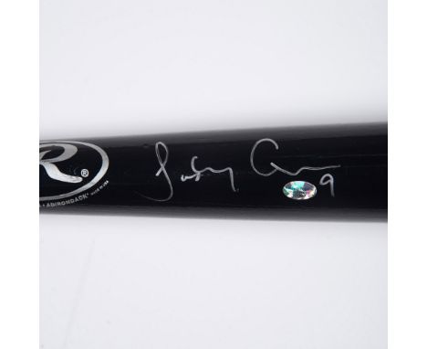 This is a black Big Stick Jody Gerut professional model baseball bat signed in silver by Gerut. 2 Certificates of Authenticit