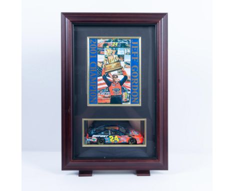 This beautiful freestanding wooden cabinet displays an artistic collage of Jeff Gordon and his top moments from the season, a