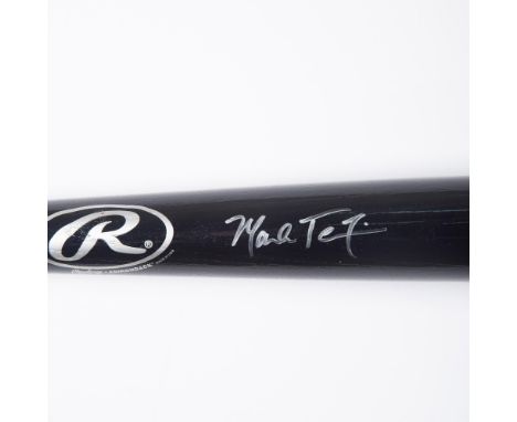 This is a black Big Stick #212B Adirondack model baseball bat signed in silver by Mark Teixeira. Mark Charles Teixeira, nickn