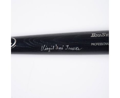 This is a black Big Stick professional model baseball bat signed in silver by MLB pitcher Virgil Trucks. Dimensions: 34"L x 8