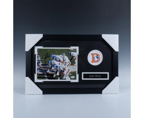 This collectible football piece features a signed photo of NFL Hall of Fame quarterback, John Elway, and a vintage Denver Bro