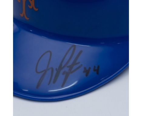 A collectible item for Mets fans, this helmet is a tangible piece of baseball history. Autographed by Jay Payton, a former Ne