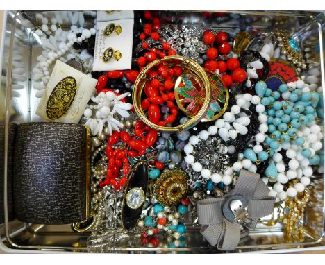 Costume jewellery including bangles, brooches, necklaces, earrings, enamel cufflinks and a tie pin set, 1.42kg