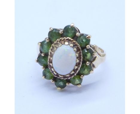 A 9ct gold, opal and peridot ring, 3.4g, L