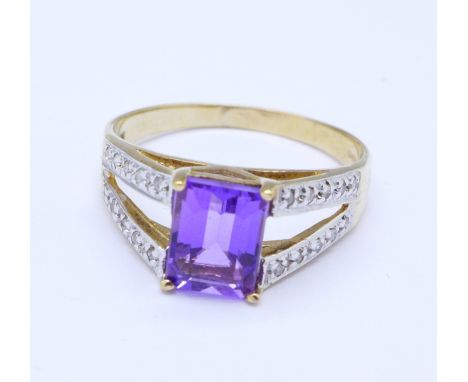 A 9ct gold, amethyst and diamond ring, 2.7g, S