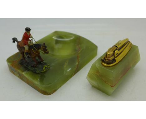An onyx dish with mounted huntsman and a table lighter