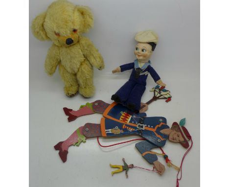 A Merrythought Teddy bear with bells in the ears, an Empire sailor toy and a puppet