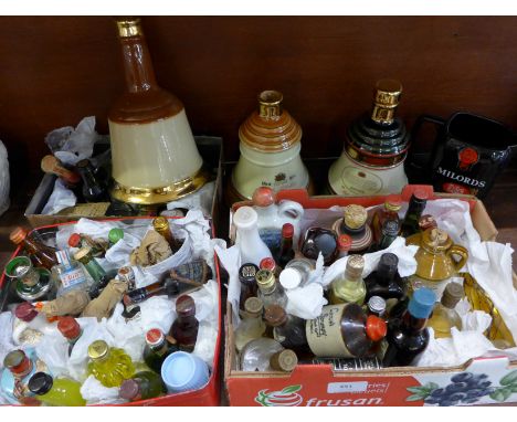 A Milords De Luxe scotch whisky water jug, three empty Bell's whisky decanters and three boxes of alcohol miniatures