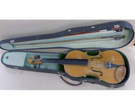 A violin and two bows, length of back without button 36.25cm