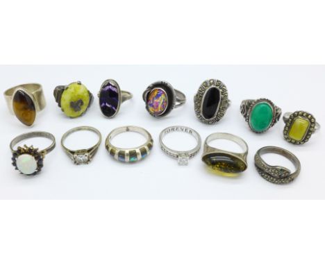 Thirteen silver and white metal rings, including opal and sapphire cluster lacking one stone and Blue John set