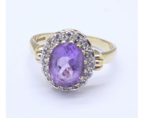 A 9ct gold, amethyst and diamond ring, 3.5g, Q