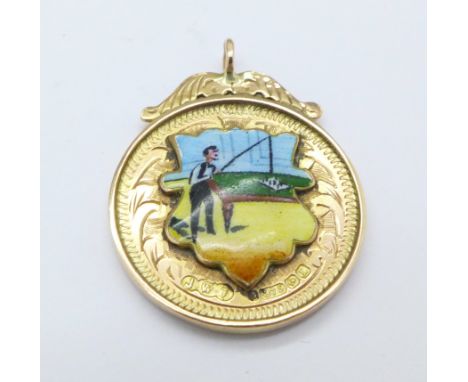 A 9ct gold fob medal with enamel fisherman, 4.5g