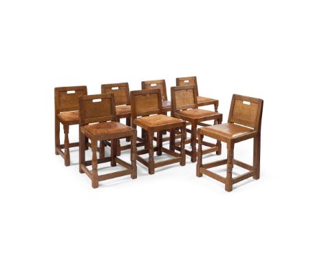  ROBERT ‘MOUSEMAN’ THOMPSON (1876-1955) SET OF EIGHT DINING CHAIRS, 1950's oak, with carved mouse signature, close-nailed lea