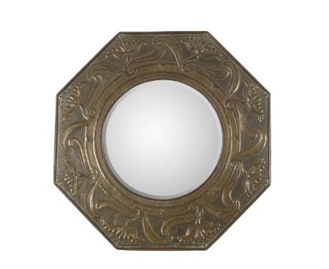  KESWICK SCHOOL OF INDUSTRIAL ARTS WALL MIRROR, CIRCA 1920 embossed brass with bevelled mirror plate, stamped maker's mark K.