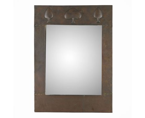  LIBERTY & CO. 'OSTADE' MIRROR, CIRCA 1902 repoussé-decorated copper, mirror plate 64cm x 46cm  Literature: Bennett D. Libert