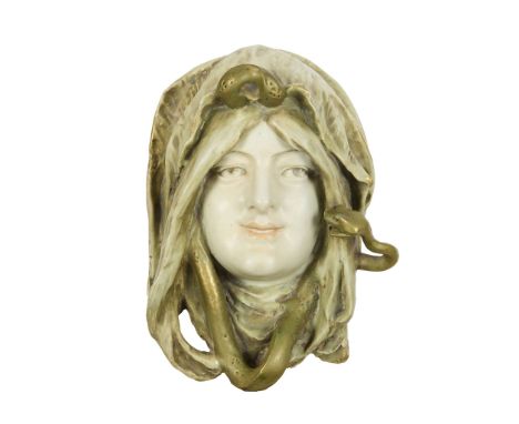  EDUARD STELLMACHER (1868-1932) AMPHORA 'PALLAS ATHENA' WALL MASK, CIRCA 1900 painted and glazed porcelain, with gilt embelli