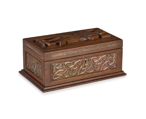  ALEXANDER RITCHIE (1856-1941) RARE CELTIC REVIVAL COFFER, CIRCA 1920 carved walnut, set with repoussé-decorated copper panel